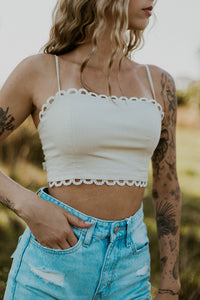 Wild Cactus Boutique Dirty Queen lace tie crop top featuring intricate lace details and a stylish tie front design.