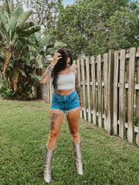 Wild Cactus Boutique Dirty Queen lace tie crop top featuring intricate lace details and a stylish tie design.