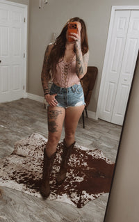Sweetheart stitch corset crop top for women by Wild Cactus Boutique, featuring fitted design and floral embroidery.