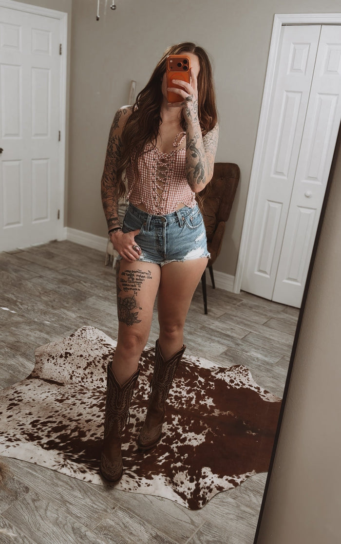 Sweetheart stitch corset crop top for women by Wild Cactus Boutique, featuring fitted design and floral embroidery.