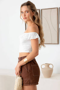 Wild Cactus Boutique live lace trim crop top with delicate lace detailing, short sleeves, and fitted style.