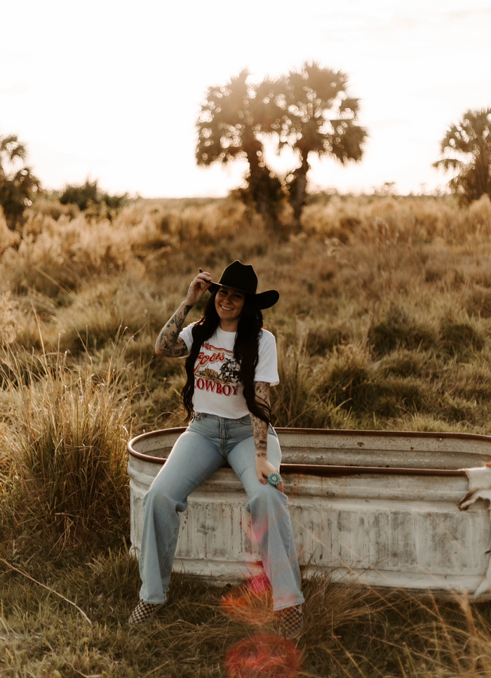 Wild West Cowboy crop top for women from Wild Cactus Boutique featuring a western-inspired design and casual fit.