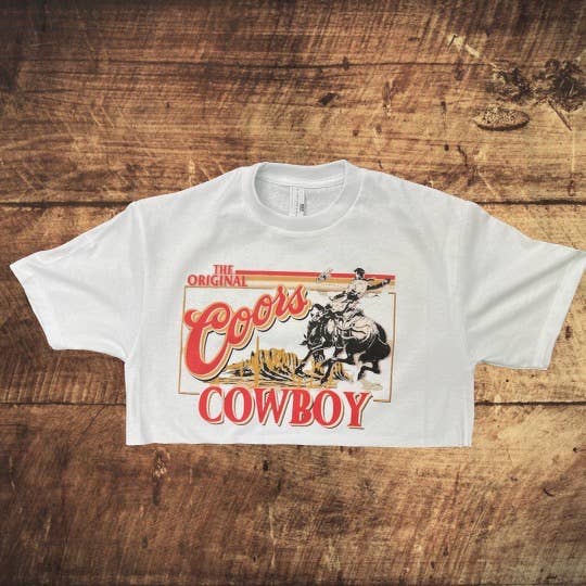 Wild West cowboy-themed women's crop top in denim with Western-inspired details from Wild Cactus Boutique.