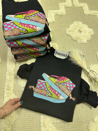 Neon Off The Wall Western graphic tee pullover by Wild Cactus Boutique featuring a vibrant Western-themed design on a casual shirt.