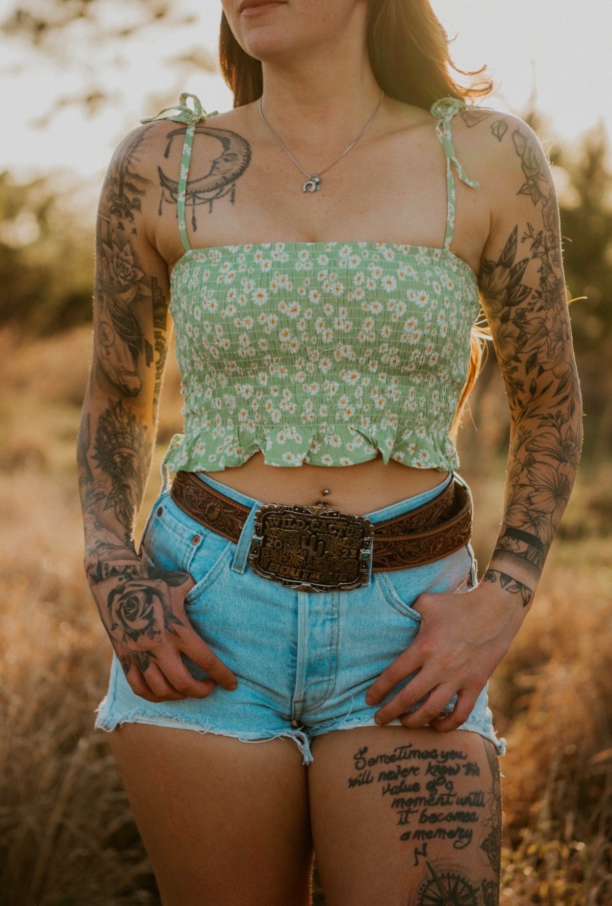 Wildflower Elegance Trail Blouse, a stylish women's shirt from Wild Cactus Boutique, featuring floral patterns and lightweight fabric.