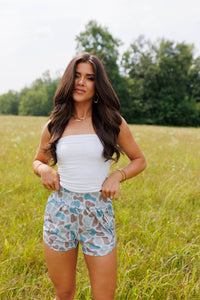 Fighter women's camo shorts by Wild Cactus Boutique, featuring a stylish camouflage pattern and casual fit.