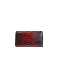 Ximena Kavalekas The Met Clutch in deep red with sleek design and minimalist style, perfect for evening or special occasions.