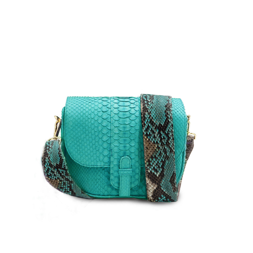Ximena Kavalekas turquoise crossbody bag featuring a sleek front view with a vibrant, stylish design.
