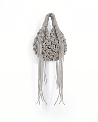 Silver chandelier handbag by Ximena Kavalekas with intricate metal detailing and a sleek, elegant design for stylish occasions.