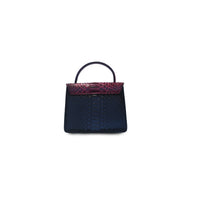 Emma handbag in wine and black by Ximena Kavalekas, featuring a stylish, structured design with dual-tone leather and elegant hardware.