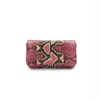 Ximena Kavalekas Enzo handbag in Electra Pink, front view showcasing sleek design and vibrant color.